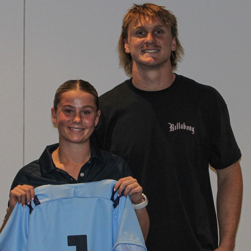 Jacob Preston presented Mya McGlynn with her NSW jersey (Photo credit Karoline Fasavalu)