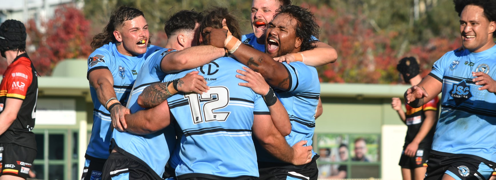 Slavin Hat-Trick Leads Sharks to First Win