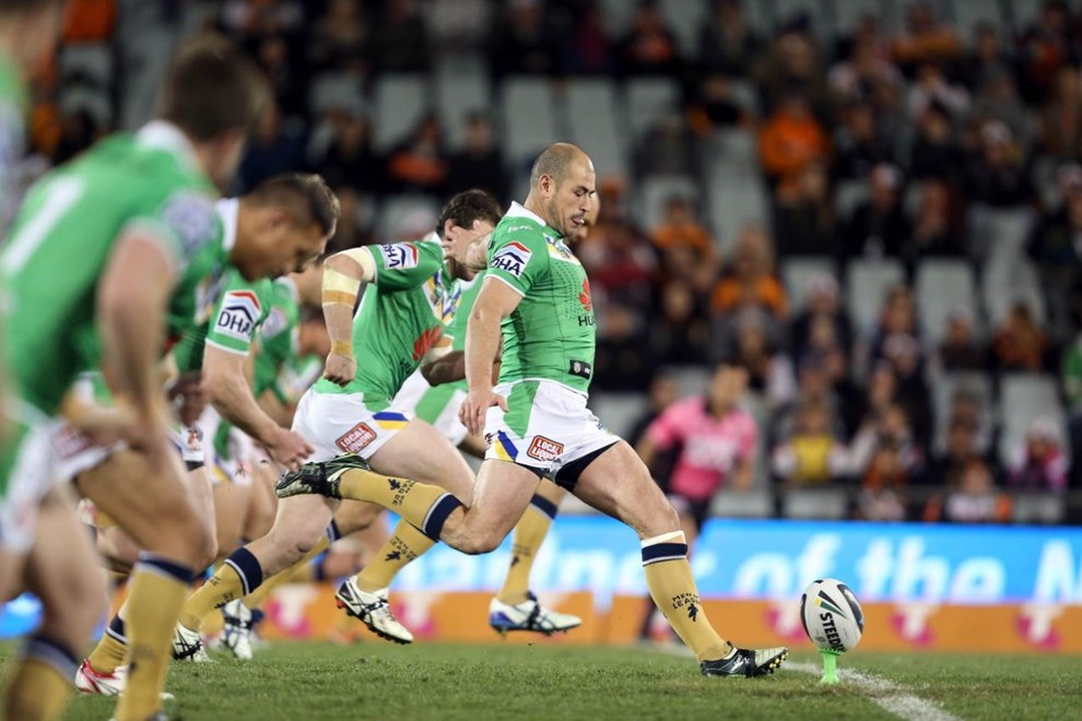 Digital Pic by Robb Cox Â© NRLPhotos.com:  terry Campese kicks off : NRL Rugby League, Wests Tigers V Canberra Raiders at Campbelltown Stadium, Saturday the 28th of June 2014.
