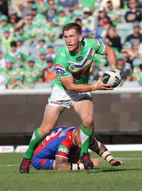 Photo by Colin Whelan copyright © nrlphotos.com :    Josh McCrone gets away from Jeremy Smith    NRL Rugby League, Telstra Cup Round 6 Canberra Raiders v Newcastle Knights at Canberra, Saturday April 12th 2014.