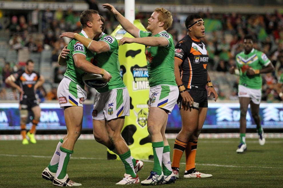 Photo by Jonathan Ng copyright nrlphotos.com : Jack Wighton celebrating his try with team mates during NRL Rugby League, Round 25 Canberra Raiders v Wests Tigers at GIO Stadium, Saturday 30th of August 2014.
