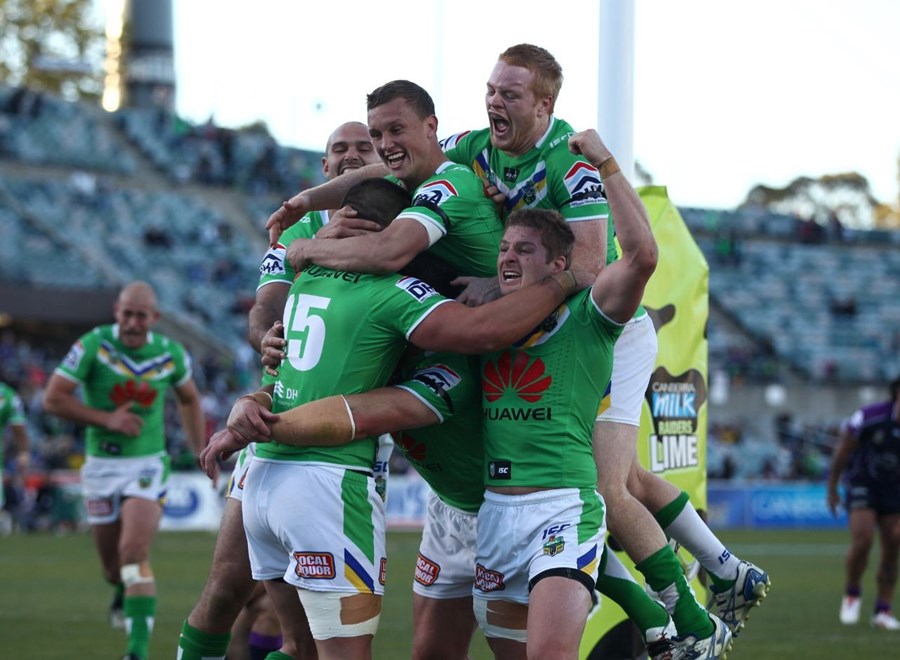 Photo by Colin Whelan copyright © nrlphotos.com :   The Raiders celebrate the winning try to Paul Vaughan    NRL Rugby League, Telstra Cup Round 7 Canberra Raiders v Melbourne Storm at Canberra, Sunday, April 20th  2014.