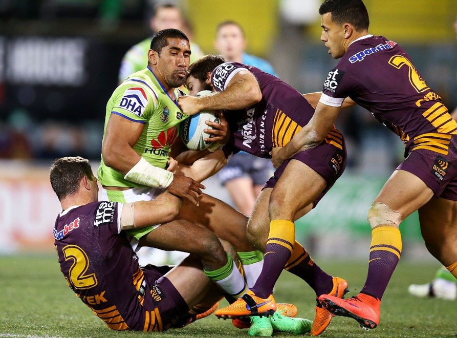 Iosia Soliola of the Raiders is tackled during the round 12 NRL match between the Canberra Raiders and the Brisbane Broncos at GIO Stadium on May 30, 2015 in Canberra, Australia. Digital Image by Mark Nolan.
