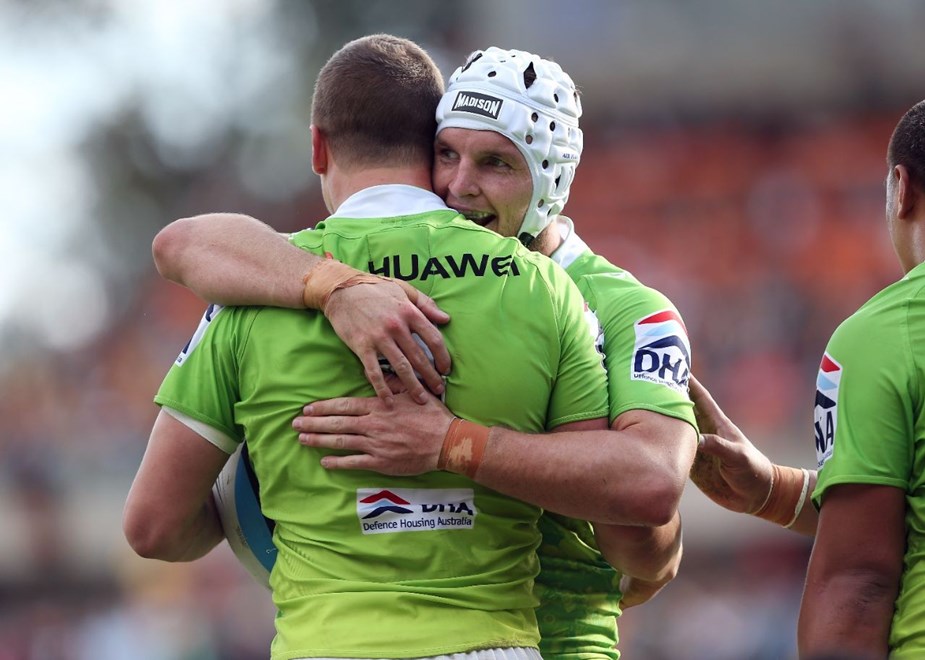 JArrod Croker embraces JAck Wighton after Wighton scored a try  : Digital Image by Robb Cox Â©nrlphotos.com: :NRL Rugby League - Wests Tigers V Canberra Raiders at Leichhardt Oval. Sunday April 19th 2015.