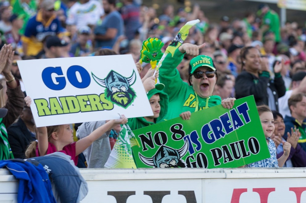Fans cheer in the crowd - 1 APRIL 2017 - Australian National Rugby League (NRL) Round 5 - Canberra Raiders vs Parramatta Eels. Match was played on a Saturday evening at GIO Stadium
