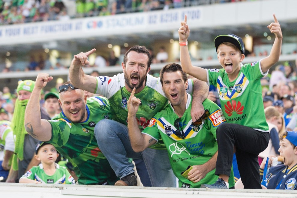 Fans cheer in the crowd - 1 APRIL 2017 - Australian National Rugby League (NRL) Round 5 - Canberra Raiders vs Parramatta Eels. Match was played on a Saturday evening at GIO Stadium